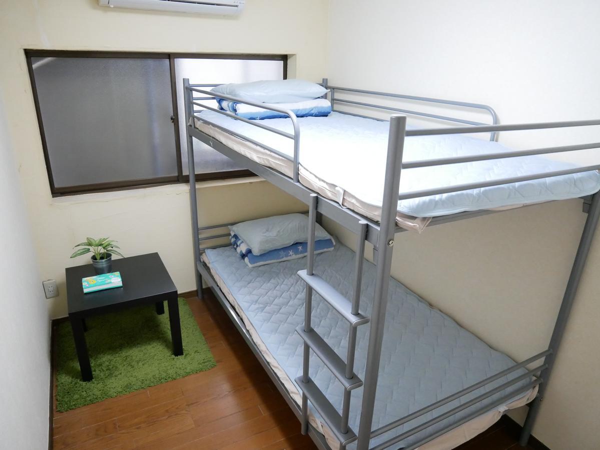 Guest House Twenty-Seven 27 Osaka Esterno foto